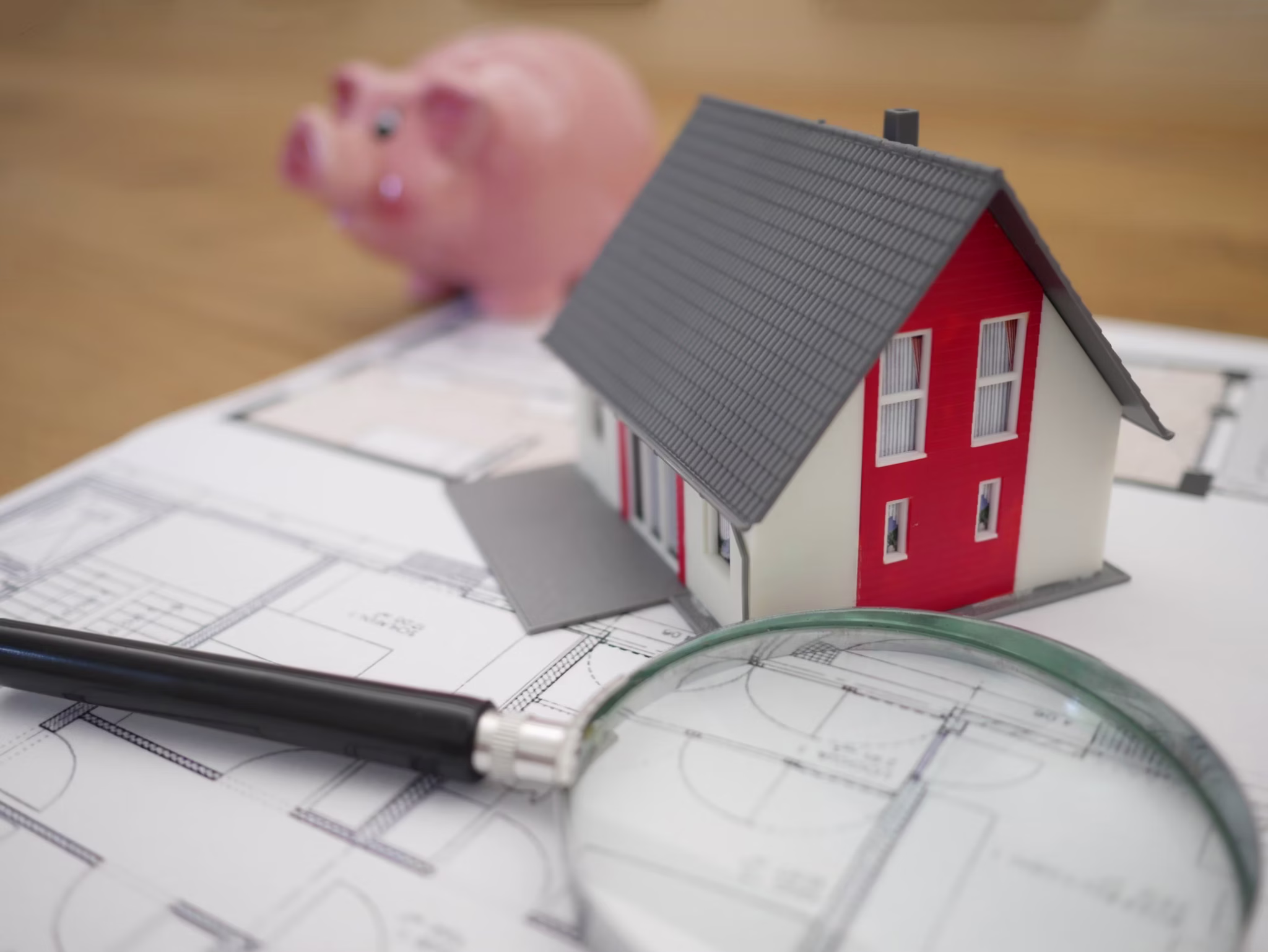 Real Estate Plans with Toy House